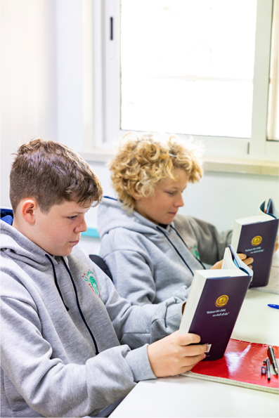 AIS GCE 665b04885aca49e5273521ae section 2 image 3 2 boys reading 2023 03 28 22 15 47